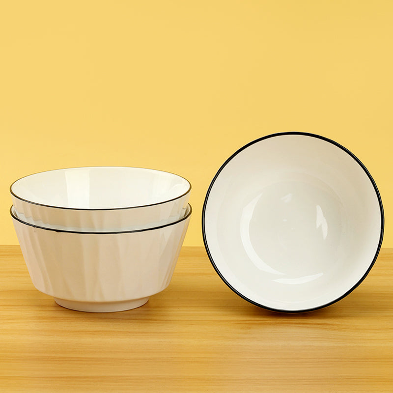 Rippled white ceramic bowl