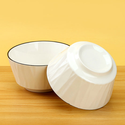 Rippled white ceramic bowl