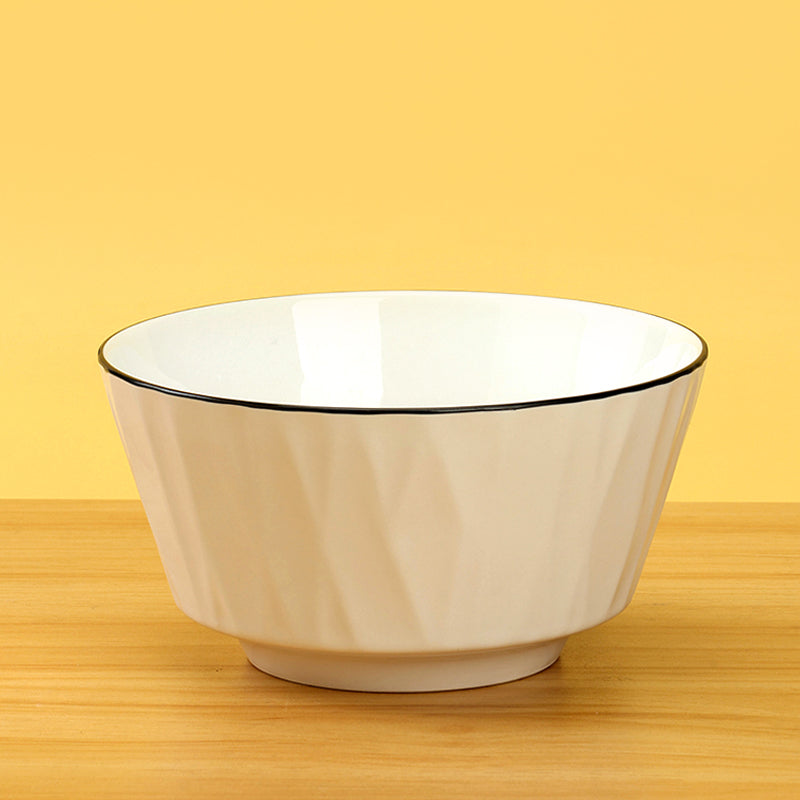Rippled white ceramic bowl