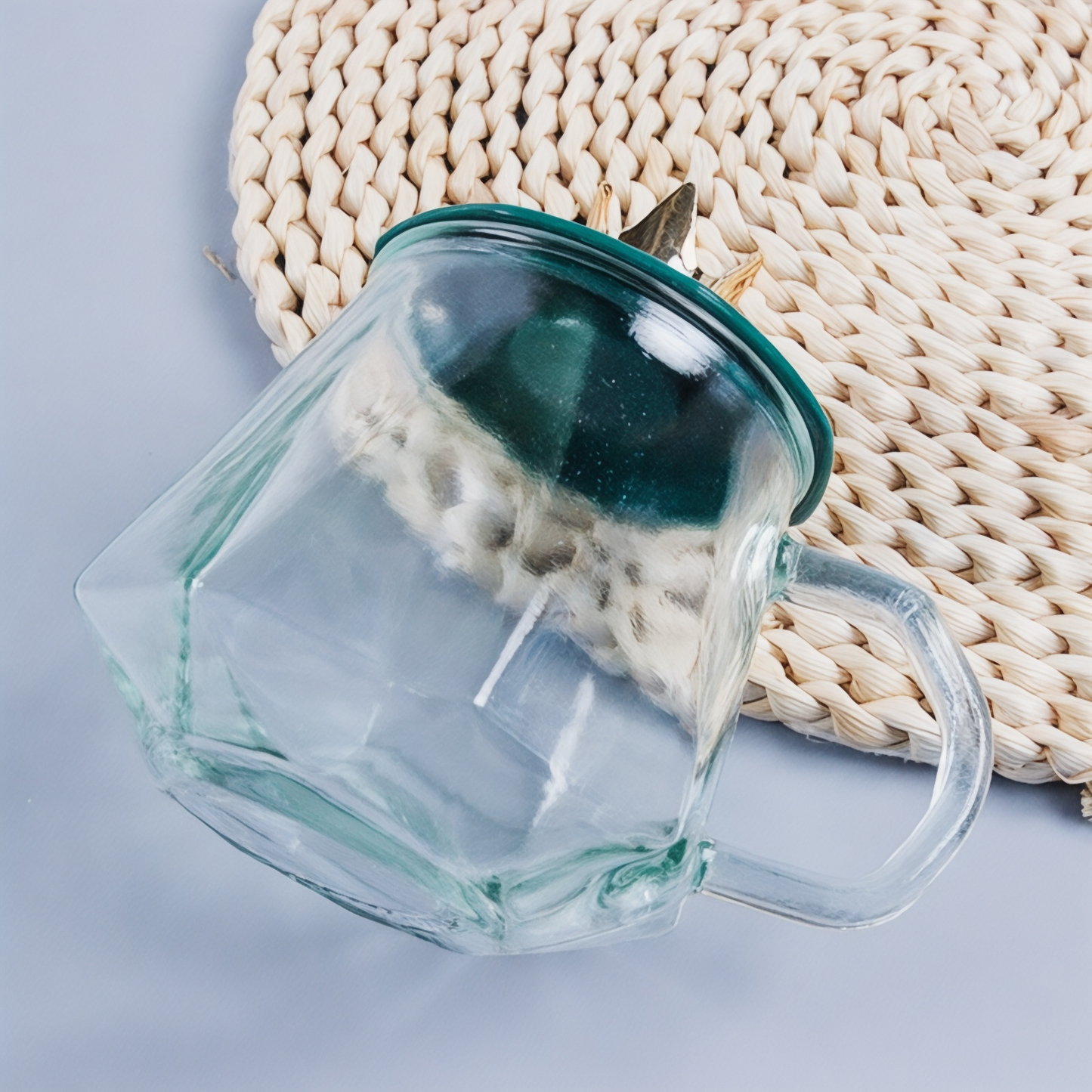 Glass cup with crown lid